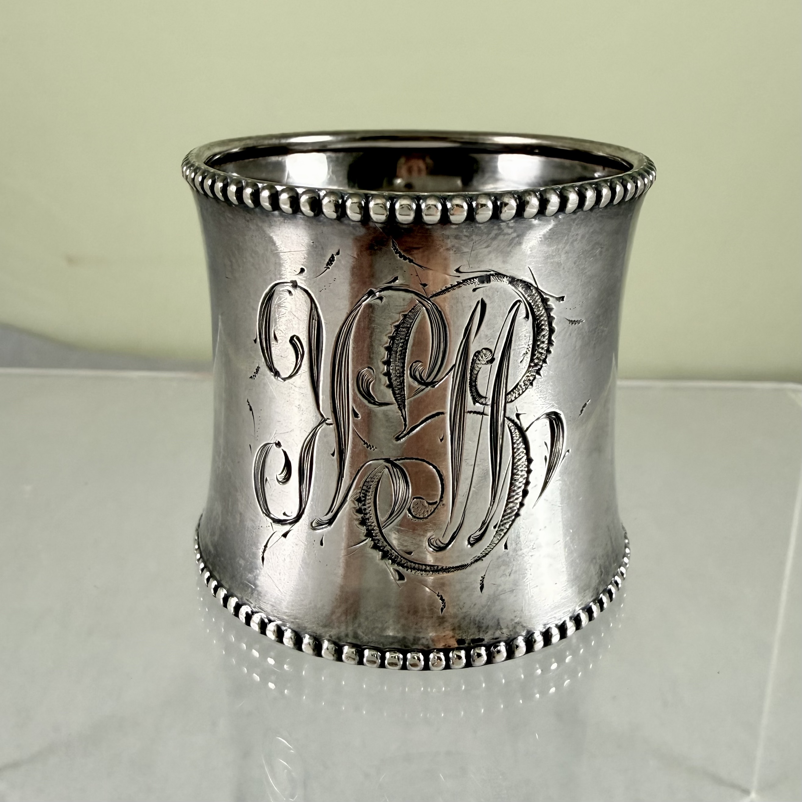 Sterling Silver Cinched Napkin Ring - Beaded Tops
